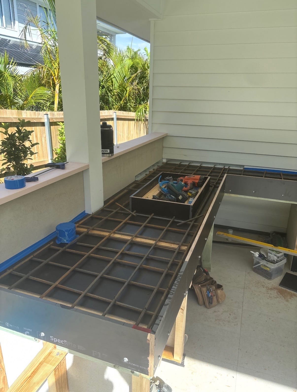 Custom formwork for architectural concrete benchtop at Avalon