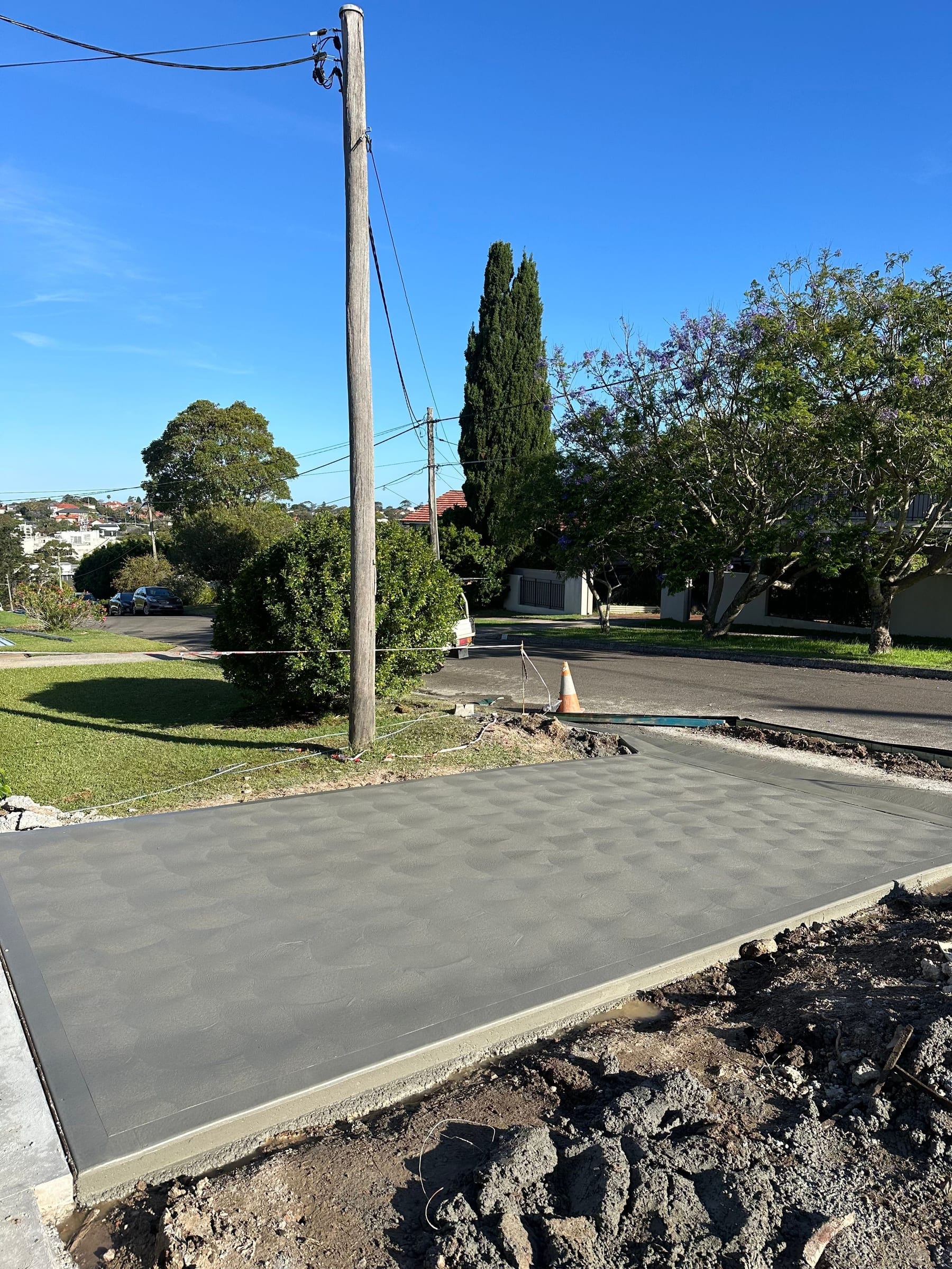 Exposed aggregate concrete driveway