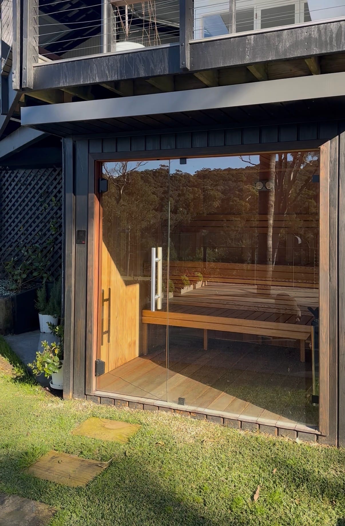 Burnished concrete slab forming the foundation for an outdoor sauna area